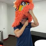 Jon Finkel putting on the Miami Heat mascot costume